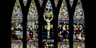 CE Kempe stained glass in the Chancel, 1883. The great east window depicting the crucifixion and events after the resurrection.