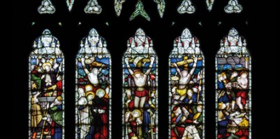 CE Kempe stained glass in the south transept, 1890. The great atonement window.