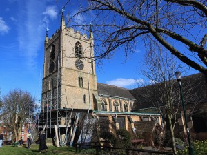 The church tower before restoration work started, scaffolding starting to be erected