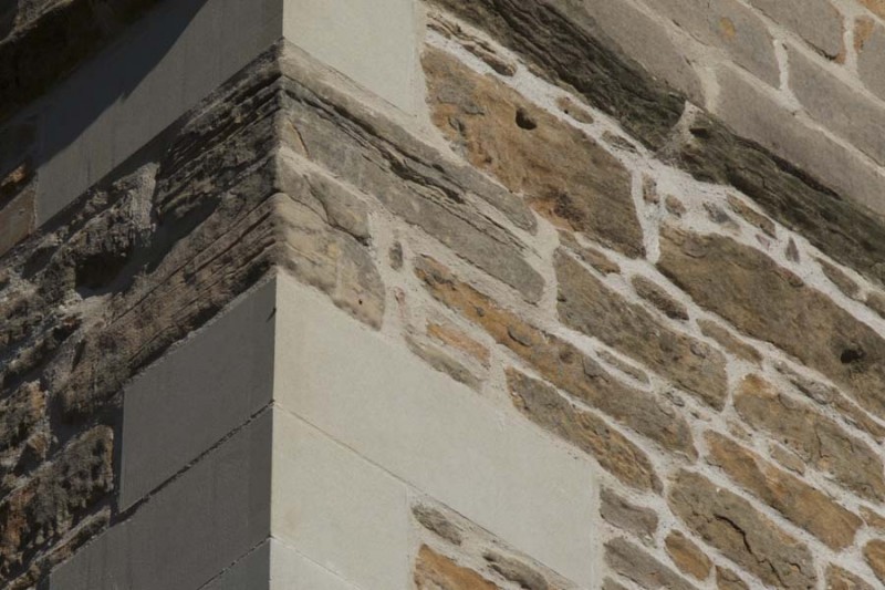 Close up of new stonework to south west corner of tower
